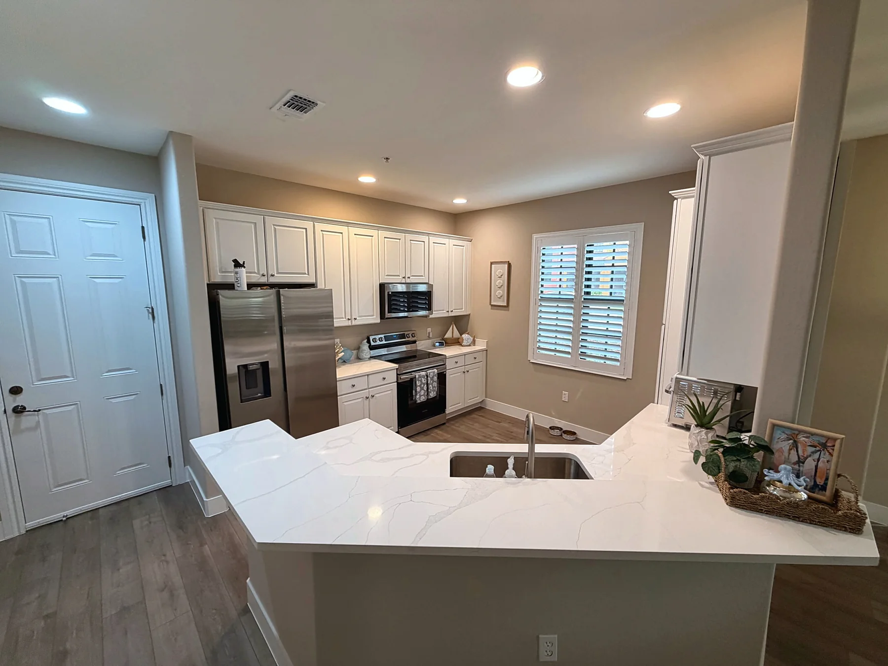 Renovated kitchen with stainless appliances